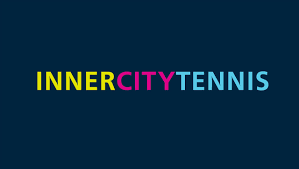 The words 'inner city tennis' in all caps and multiple colors on a blue background